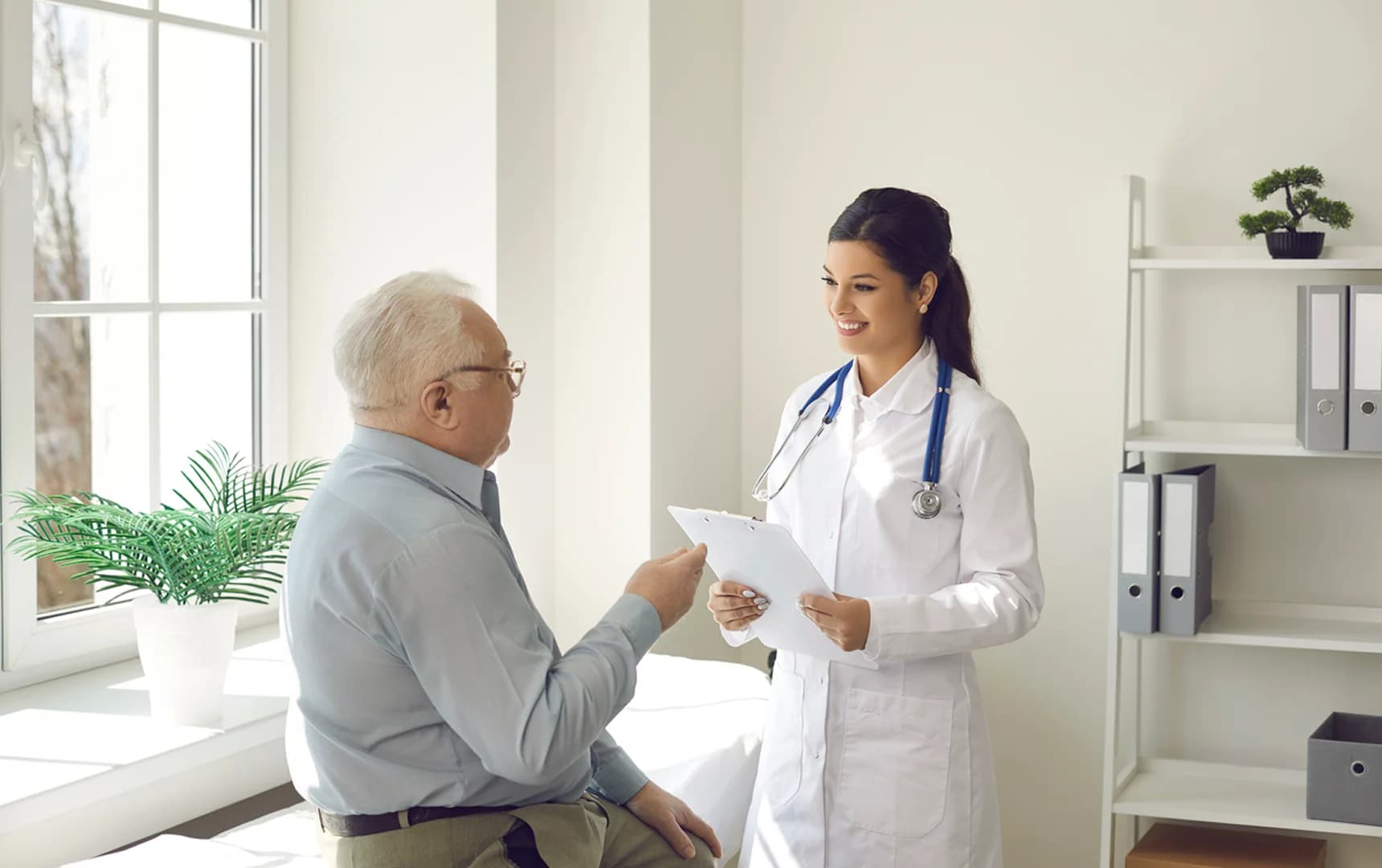 Primary care doctor with patient