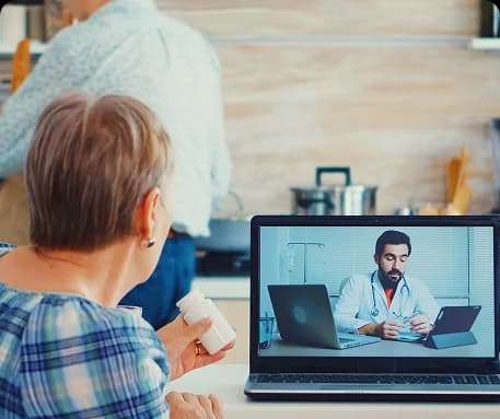 Patient engaging with healthcare technology outside the clinic, demonstrating extended practice reach.